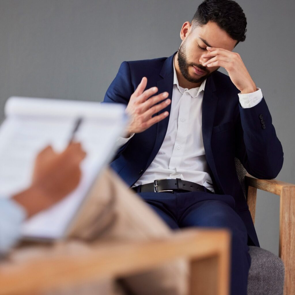 12 Mind blowing truths you won’t learn until you’ve had therapy Sad Man Consulting Therapist In Therapy Or Counsel 39HMNFY Scaled 1 1024x1024